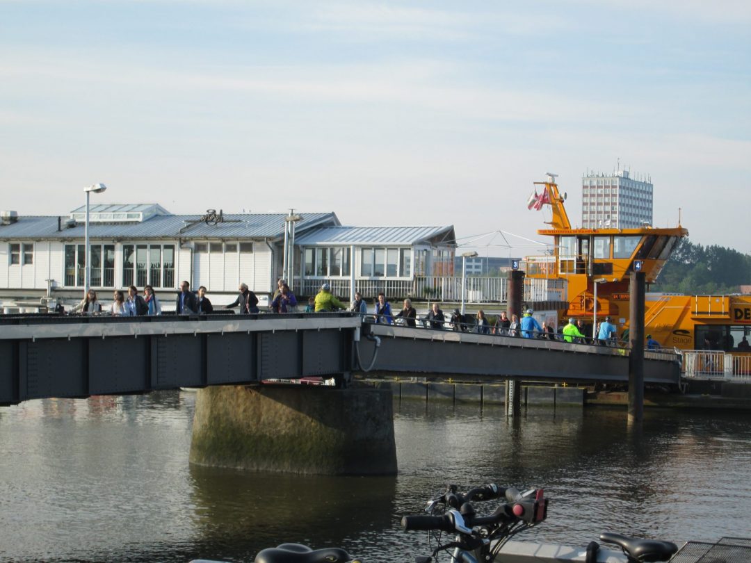 Commuters Taking The Ferry To And From Teufelsbrück In Hamburg, Germany